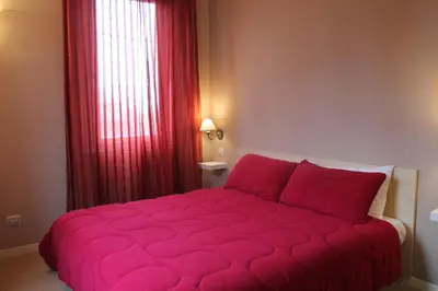 Letto o letti in una camera di Room & Breakfast A casa di Emma