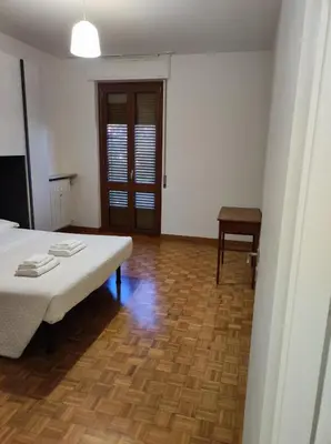 Letto o letti in una camera di Golgi Archimede Casa