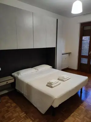 Letto o letti in una camera di Golgi Archimede Casa