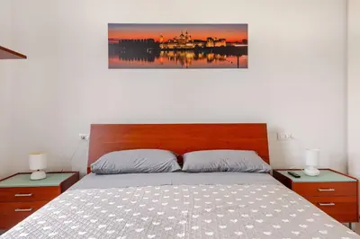 Letto o letti in una camera di BellaMantova 4