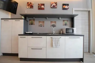 Cucina o angolo cottura di 243b - Appartamento Mignon - Sara Home Chiavari, 200metri dal Mare