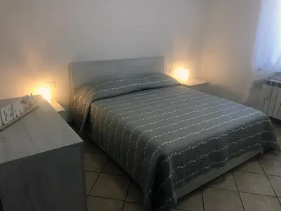 Letto o letti in una camera di Garden House Cristina La Spezia 5 terre