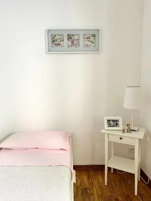 Letto o letti in una camera di La Casetta-Incantevole casa indipendente