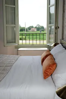 Letto o letti in una camera di Locanda La Motta