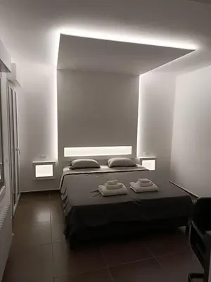 Letto o letti in una camera di CIVICO 14 Holiday Rooms