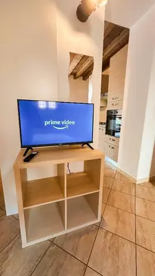 TV o dispositivi per l'intrattenimento presso Artistic Urban Apartment