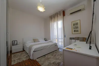 Letto o letti in una camera di Modena - vicino al centro - Free Parking & Wi-Fi