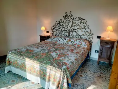Letto o letti in una camera di Arca di Ne