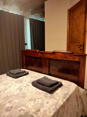 Letto o letti in una camera di Arca di Ne