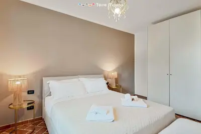 Letto o letti in una camera di Villa Effe, Terre Marine