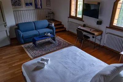 Letto o letti in una camera di B&B Villa Argiolas