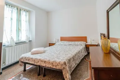 Letto o letti in una camera di 139b - Casa Santa Vittoria, 10 minuti dal mare e spiaggia di Sestri Levante