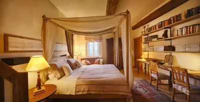 Letto o letti in una camera di Il Castello di Tassara