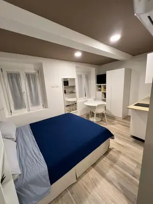 Letto o letti in una camera di Residence della Accademia