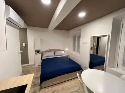 Letto o letti in una camera di Residence della Accademia
