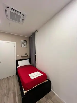 Letto o letti in una camera di Residence della Accademia