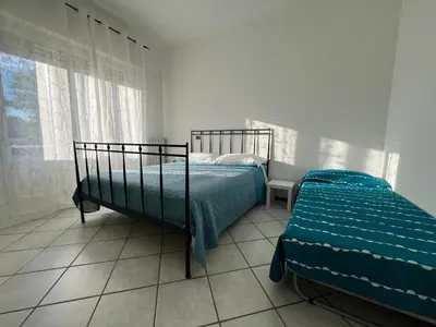 Letto o letti in una camera di O&R Home Crema
