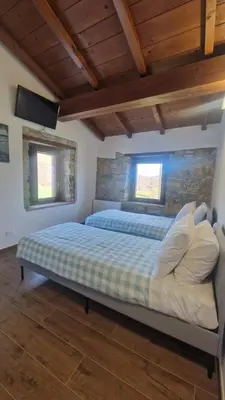 Letto o letti in una camera di Campi dei sogni Bobbio