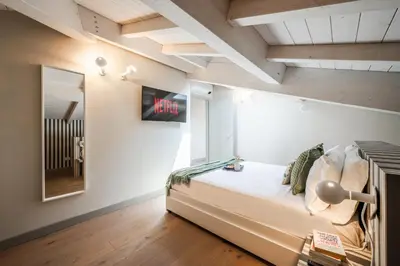 Letto o letti in una camera di Casa della Musica