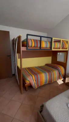 Letto o letti in una camera di Lucky House
