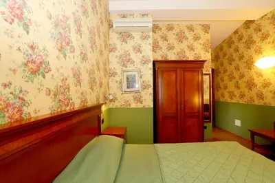 Letto o letti in una camera di Locanda Stella d'Oro