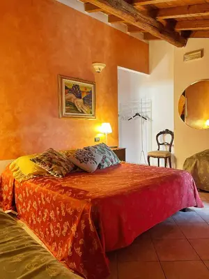 Letto o letti in una camera di B&B La Cascina di Alice