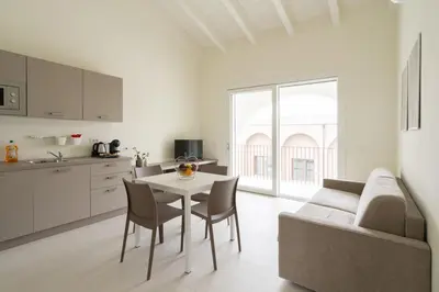 Cucina o angolo cottura di Nour Apartments - La Corte del Re