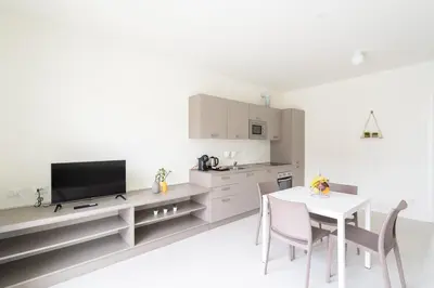Cucina o angolo cottura di Nour Apartments - La Corte del Re