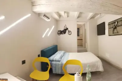 Letto o letti in una camera di A due passi dal castello