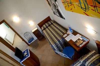 Letto o letti in una camera di 9 Muse Bed and Breakfast
