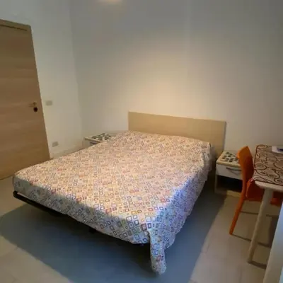 Letto o letti in una camera di CAMERE DI ARHET