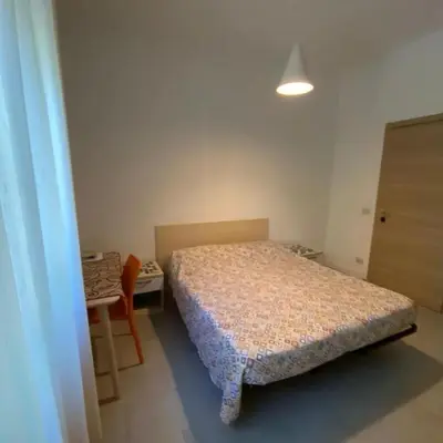 Letto o letti in una camera di CAMERE DI ARHET