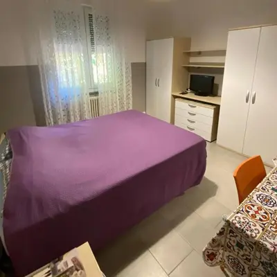 Letto o letti in una camera di CAMERE DI ARHET