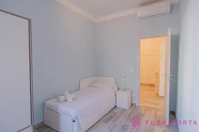 Letto o letti in una camera di FuoriPorta Affitti Brevi - Casa da Antonella 11