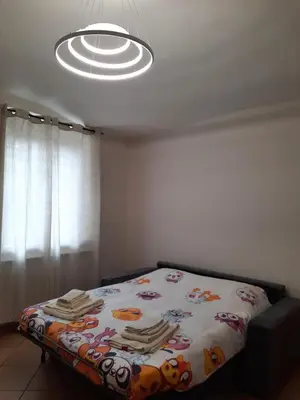Letto o letti in una camera di Appartamento IL GIGLIO