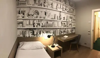 Letto o letti in una camera di Albergo Tre Pozzi