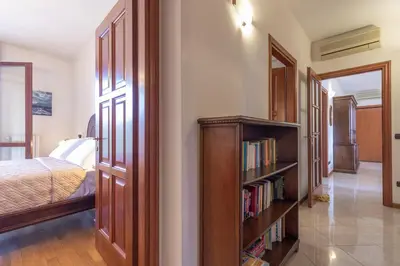 Letto o letti in una camera di Suite Magenta - Affitti Brevi Italia