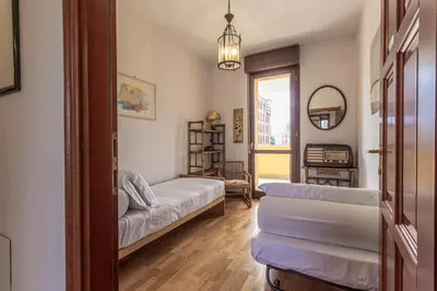 Letto o letti in una camera di Suite Magenta - Affitti Brevi Italia