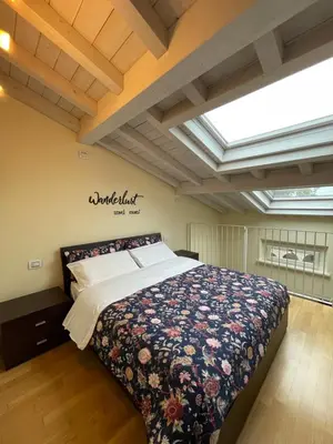 Letto o letti in una camera di Cozy flat
