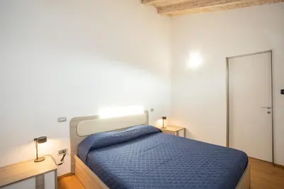 Letto o letti in una camera di Appartamento Siliprandi