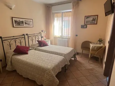 Letto o letti in una camera di Il Timone Loreto