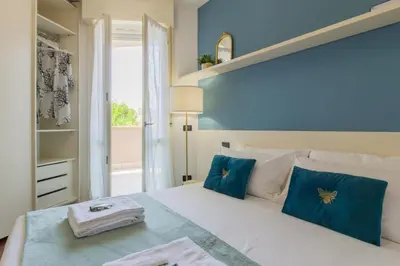 Letto o letti in una camera di Crema, terrazza, a pochi passi dal centro città