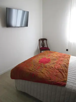 Letto o letti in una camera di casa dei ragazzi