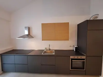 Cucina o angolo cottura di FuoriPorta Affitti Brevi - Le Petit Arc