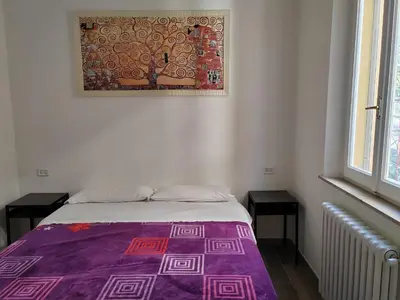 Letto o letti in una camera di casa vicomero