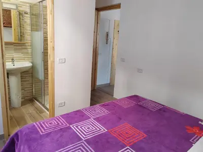 Letto o letti in una camera di casa vicomero