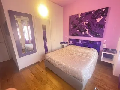 Letto o letti in una camera di Rooms Of Love