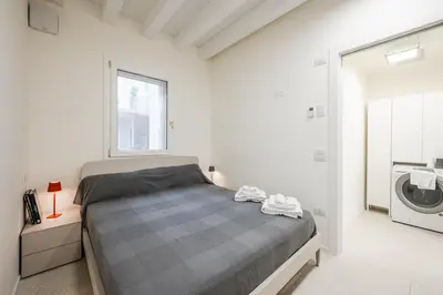 Letto o letti in una camera di Loft Il Moro 2 Maranello Sassuolo Free Netflix & wi-fi