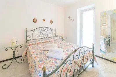 Letto o letti in una camera di 213b - Casa Panorama Marino - A pochi passi dalla spiaggia di Riva, Vista Mare fino a Portofino