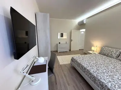 Letto o letti in una camera di A due passi da Piazza Cavalli